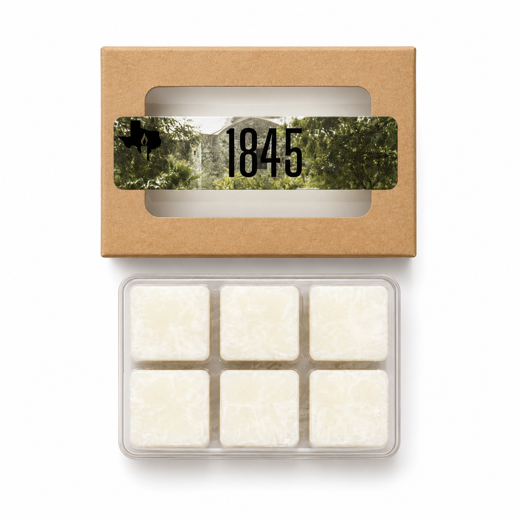 The 1845 wax melts: kraft window box with oak tree label above an open clamshell of six white soy wax cubes