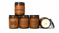 Collection of candles with labels on a white background